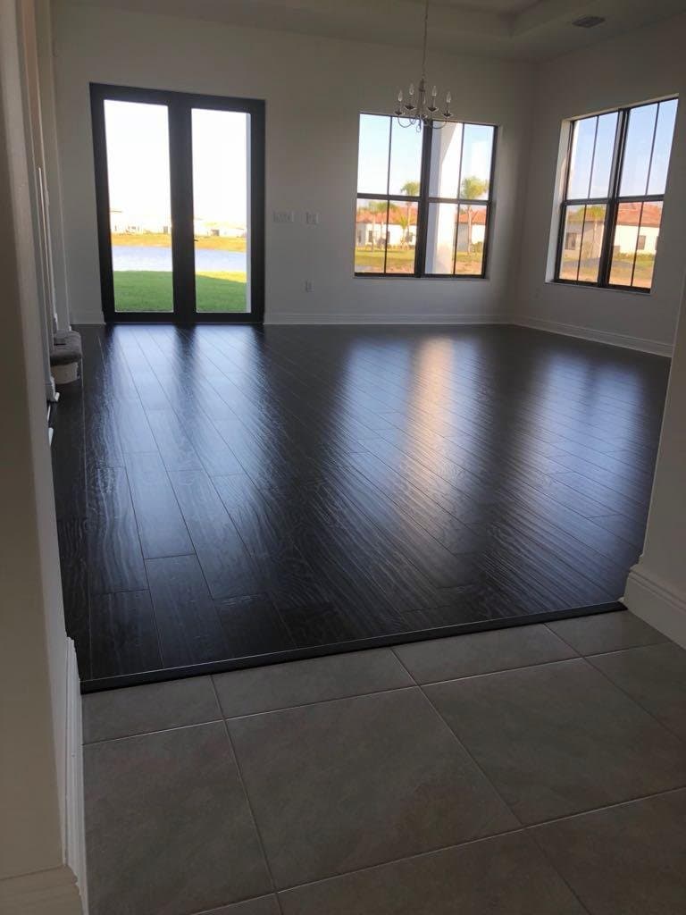 Dark wood flooring installation - Master Cabinets